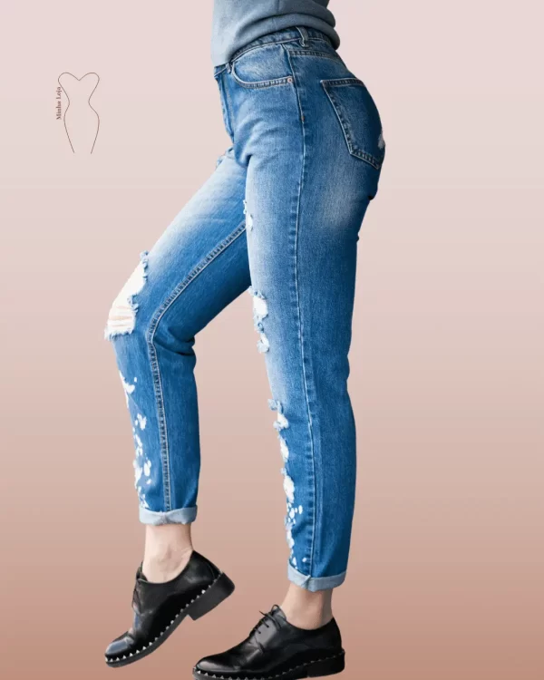 calça jeans desfiada